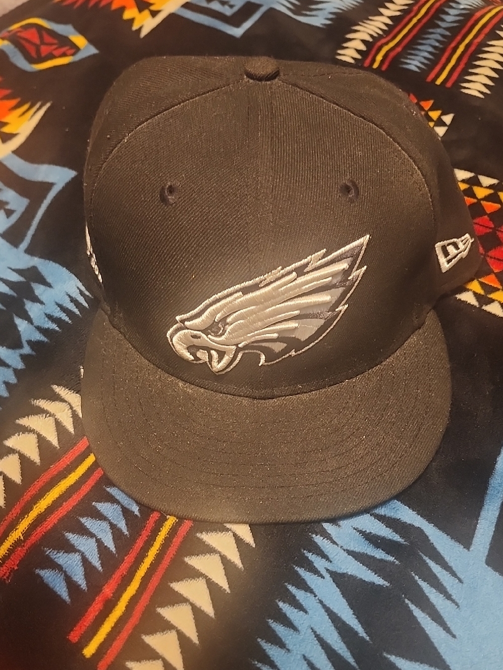 New Era Black Philadelphia Eagles Fitted Cap with Silver Logo